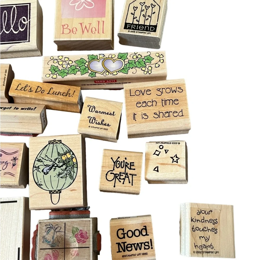Lot of 20 rubber stamps. Most of the stamps are brand new.
